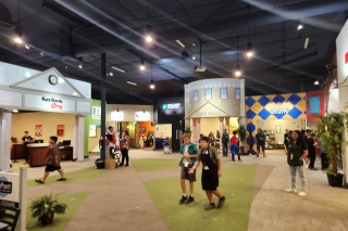 Children walking around the set of a town