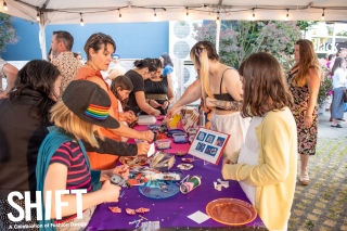 Women and girls working on a design project