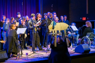 A group of performers on stage