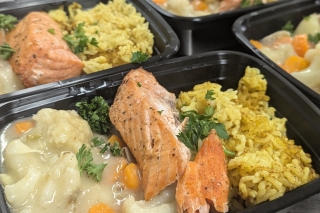 Several dinners of salmon, vegetables and rice