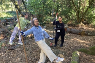 Three H.O.P.E volunteers working with pruning tools