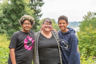 Photo of a mother and two teenagers