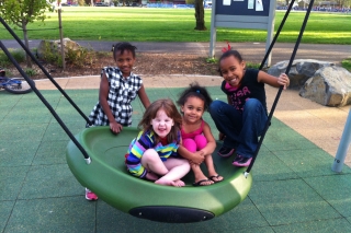Photo of girls on a swing
