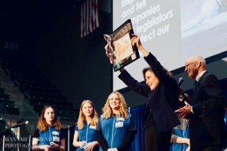 Photo of SAGE receiving recognition